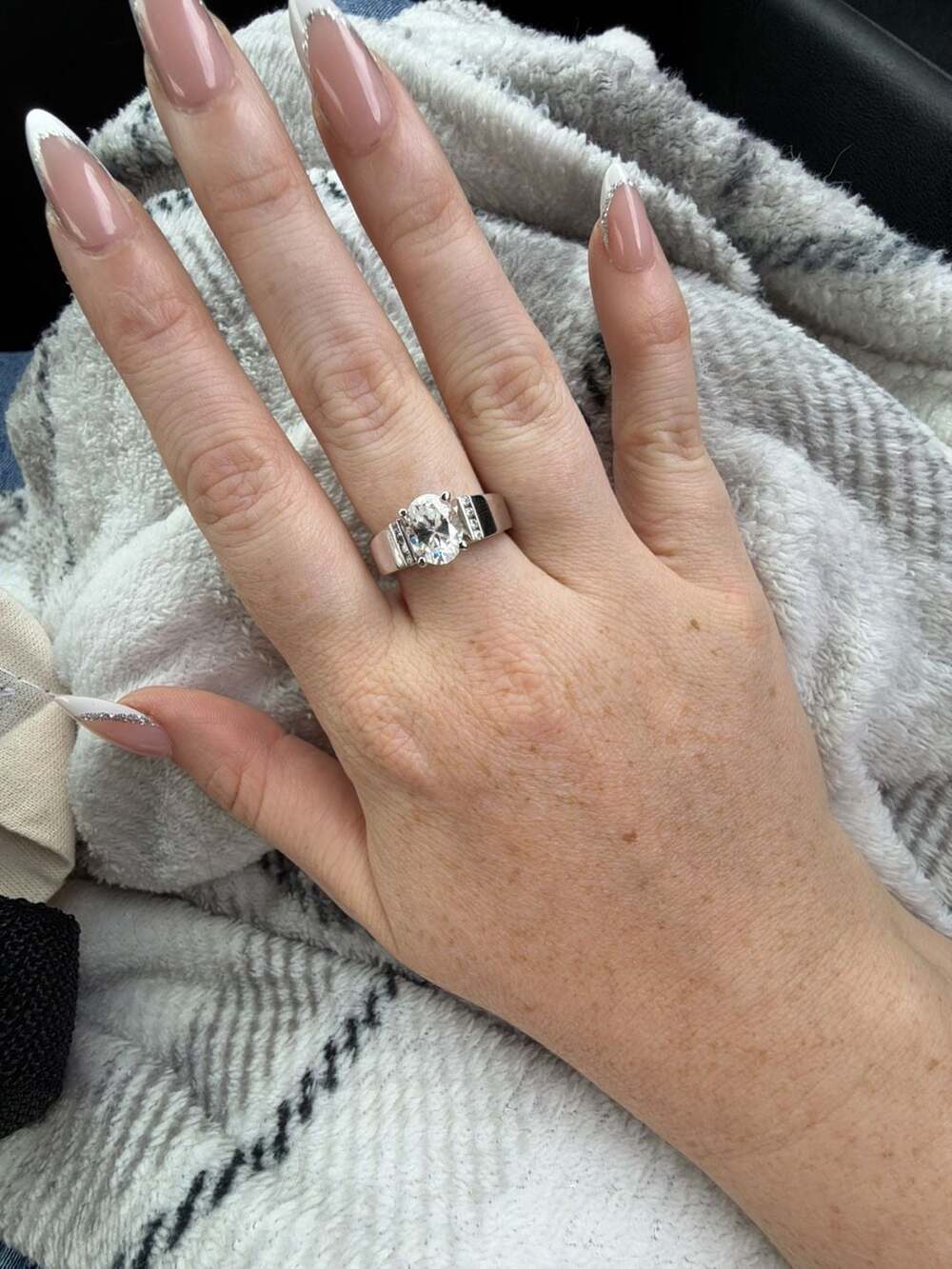 Sterling Silver Oval Cubic Zirconia Ring with Accent Stones